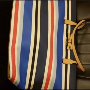 Brand New with tags Kate Spade purse. Never used.